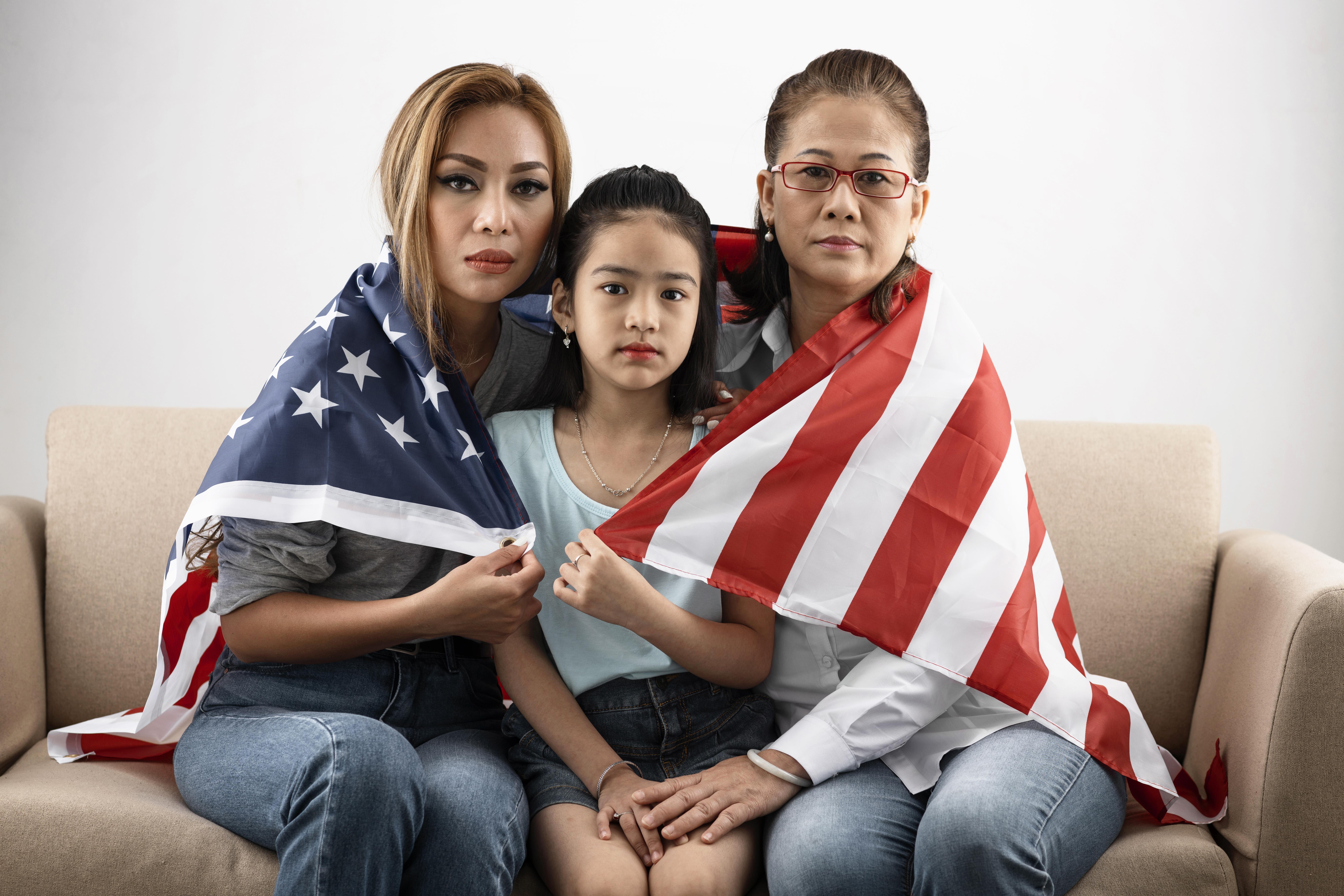 medium-shot-women-kid-with-flag